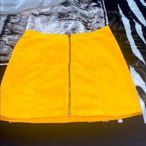 an orange mini skirt